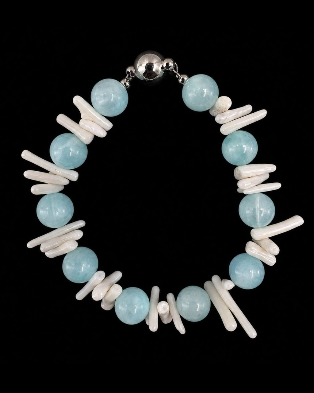 Aqua Shell Pearl Bracelet on a black background