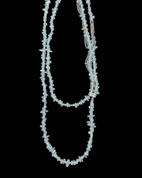 Aquamarine Chip Silver Chain Necklace on a black background