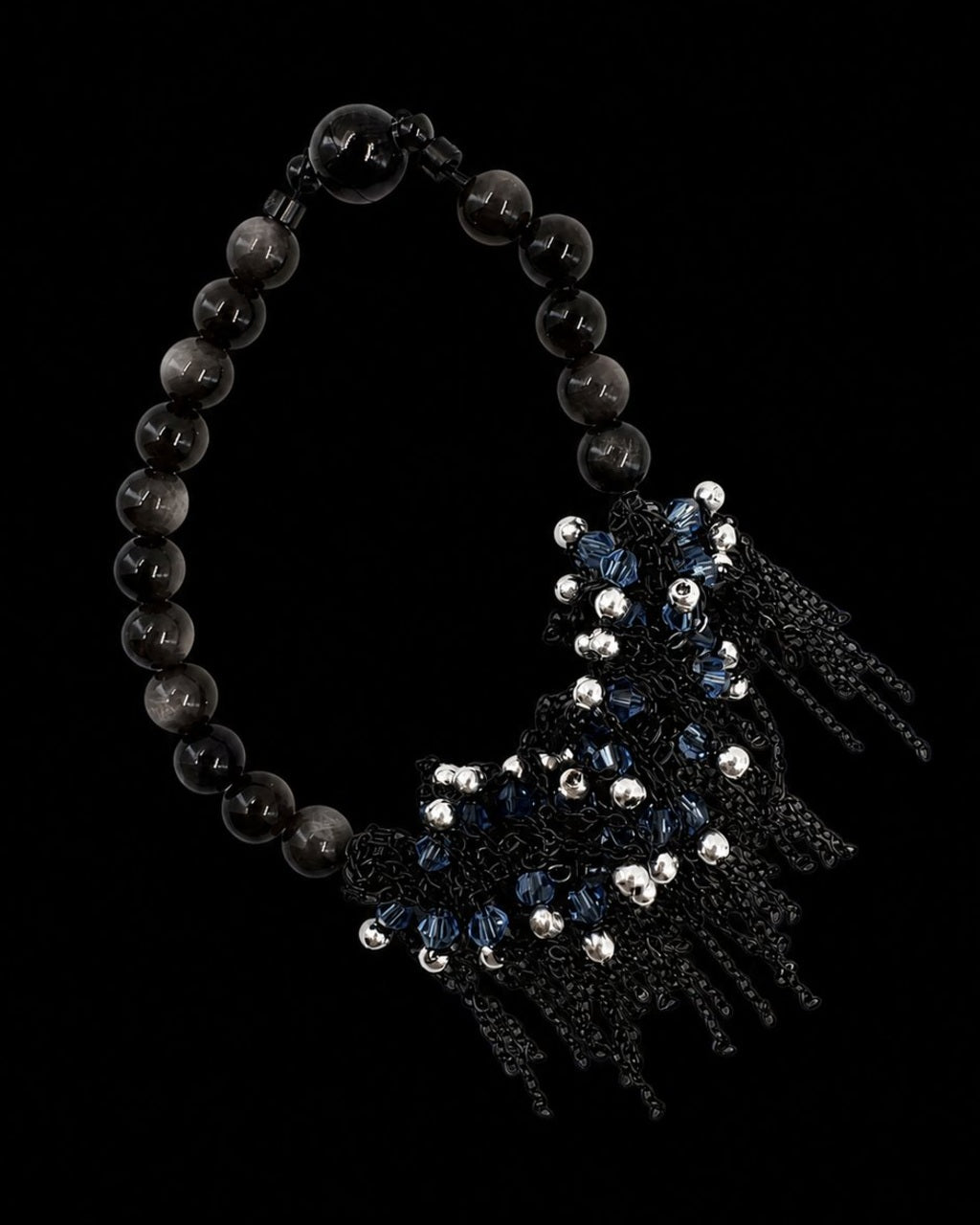Black Blue Chain Tassel Bracelet on a black background
