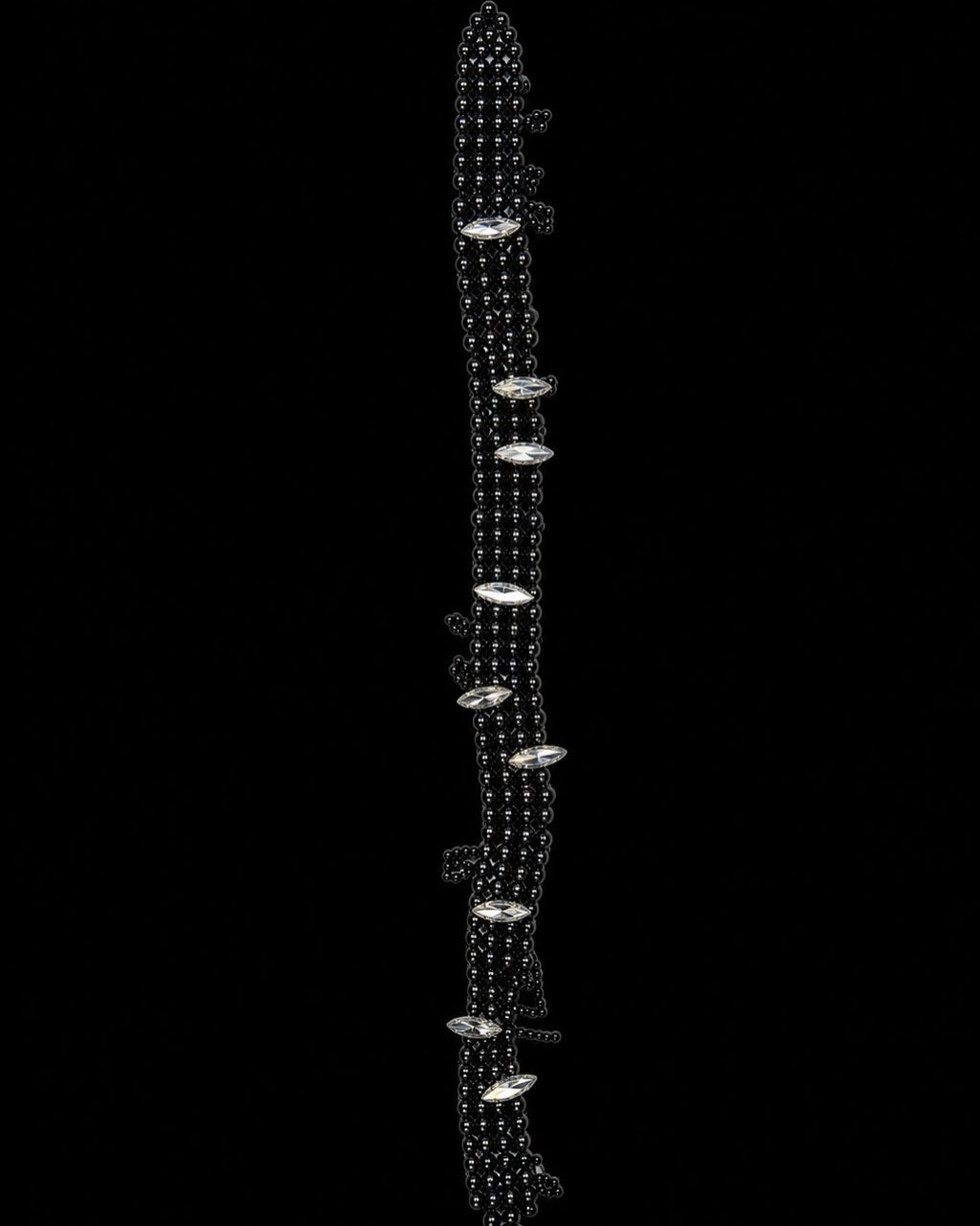 Black Crystal Bead Chain Necklace on a black background