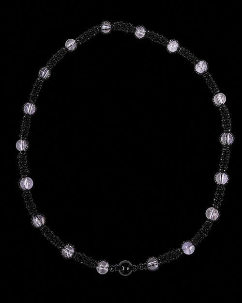 Black Lavender Bead Necklace on a black background