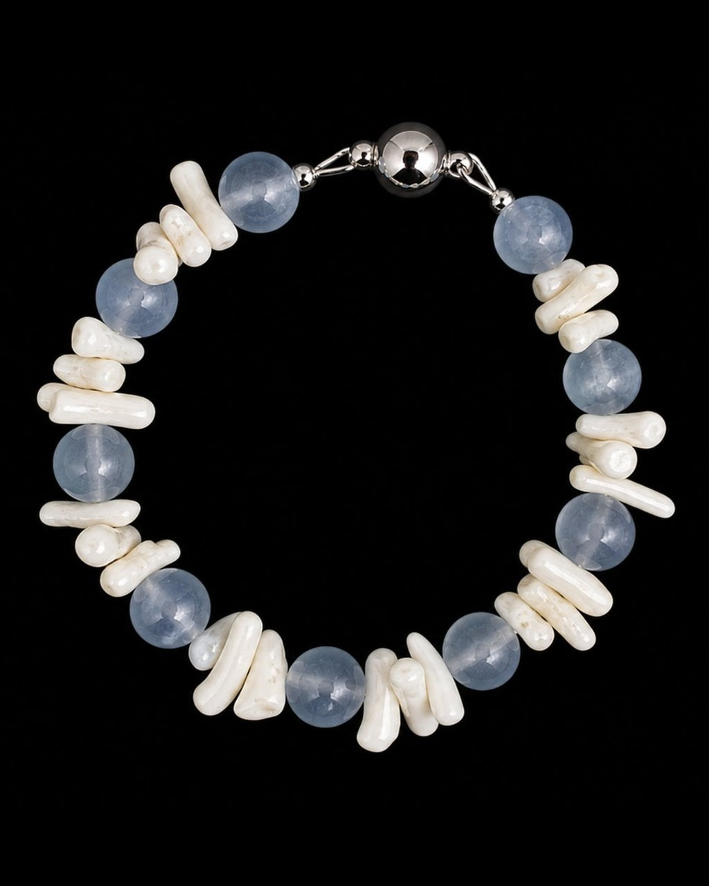 Blue Shell Pearl Bracelet on a black background