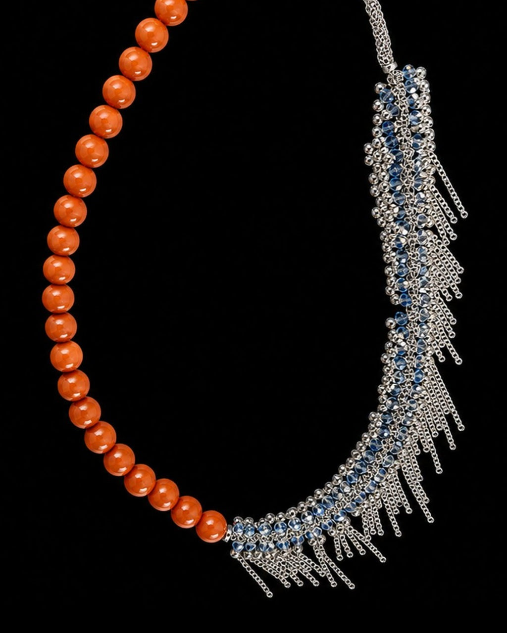 Coral Blue Crystal Fringe Necklace on a black background