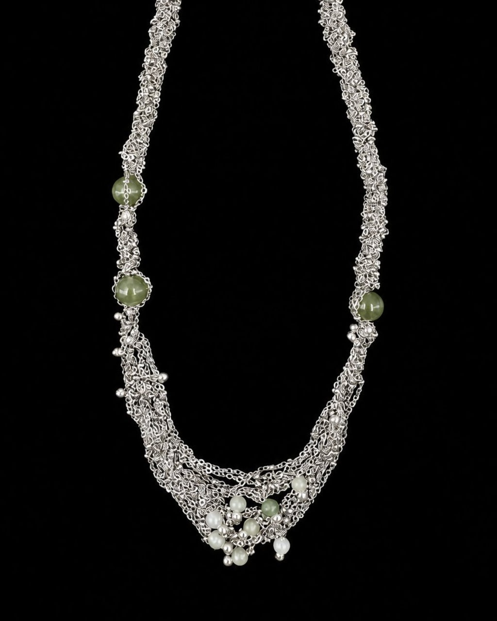 Silver Green Stone Pearl Necklace on a black background