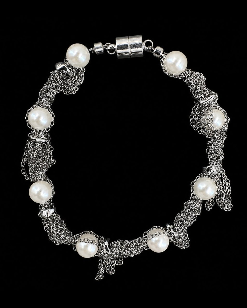Silver Pearl Chain Bracelet on a black background