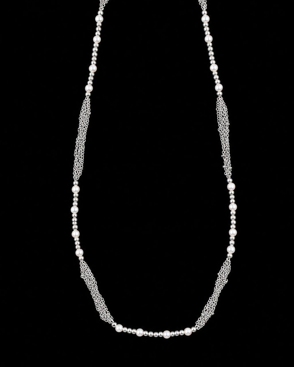 Silver Pearl Chain Necklace on a black background
