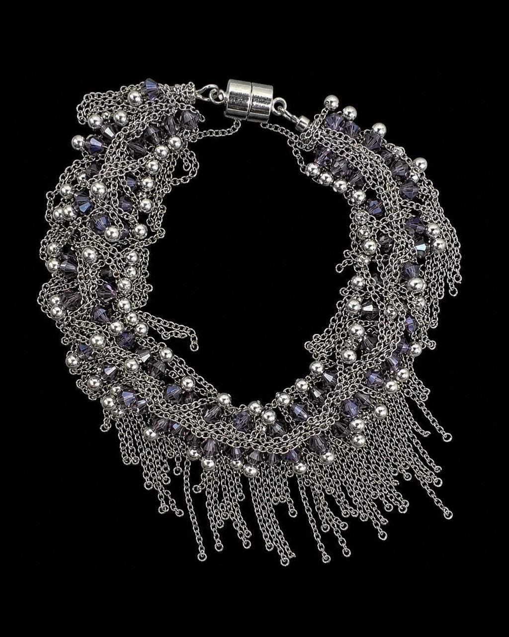Silver Purple Crystal Fringe Bracelet on a black background