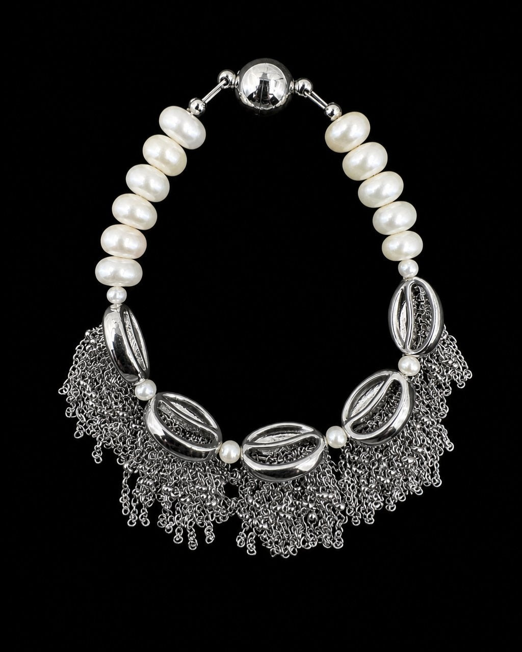 Silver Shell Pearl Tassel Bracelet on a black background