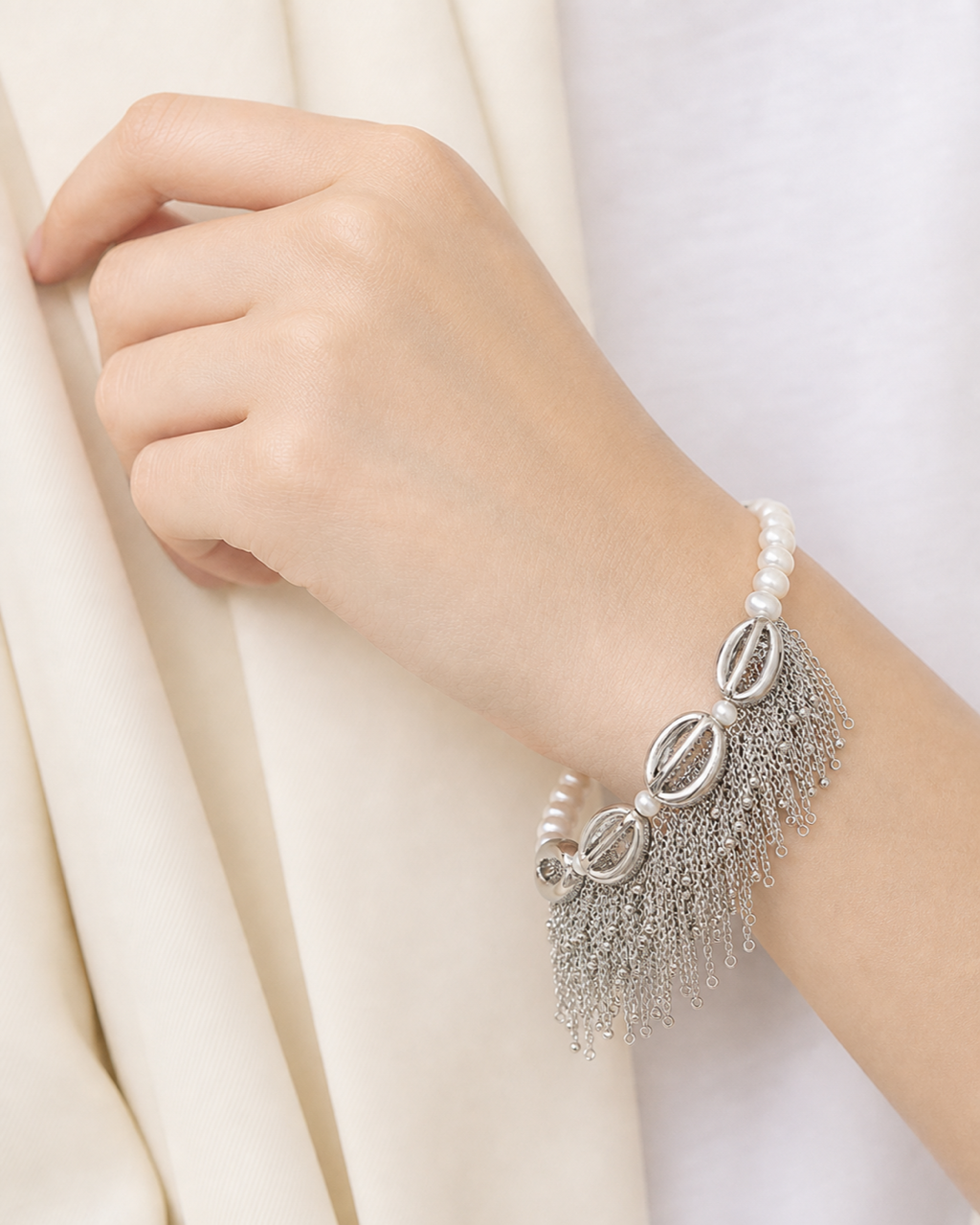 Silver Shell Pearl Tassel Bracelet worn on model