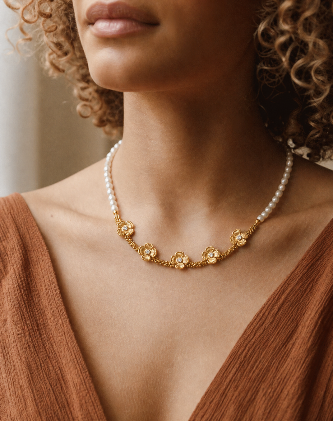 Close view of a model wearing a fine necklace