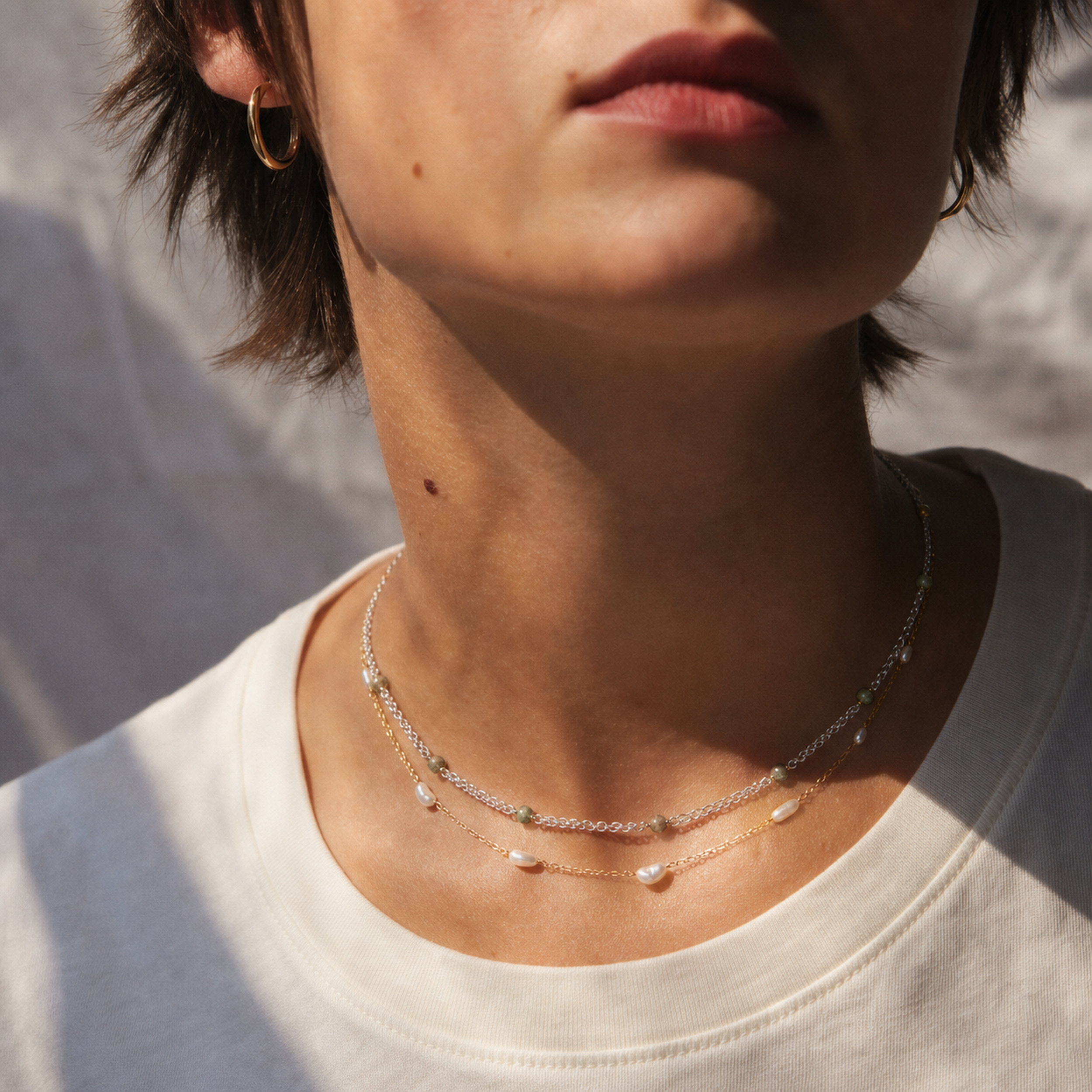 Model wearing a simple necklace